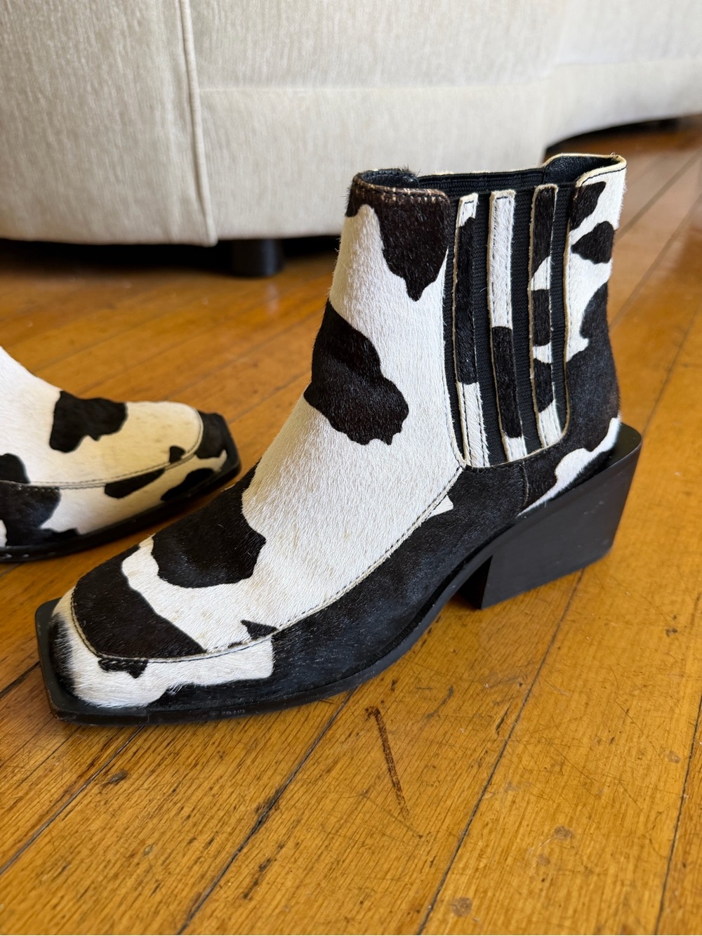 INTENTIONALLY BLANK Black & White Cow Print Ankle Booties